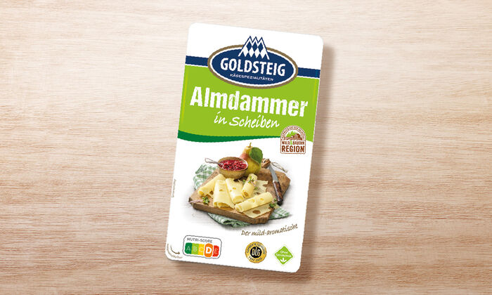 Almdammer Scheiben - GOLDSTEIG Käsespezialitäten Almdammer Scheiben von GOLDSTEIG in Verpackung