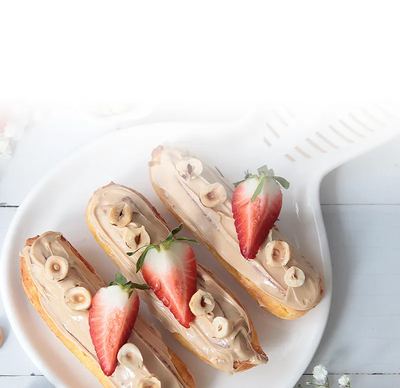Eclairs mit weißer Schokoladen-Haselnusscreme Rezept | Eclairs mit weißer Schokoladen-Haselnusscreme