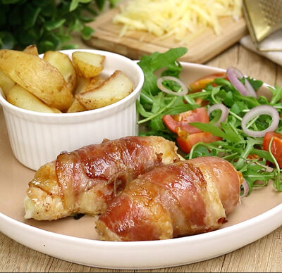 Rezepte & Inspirationen: Hähnchenbrust mit Frischkäsefüllung im Speckmantel (Emmentaler, Ricotta) - GOLDSTEIG Käsespezialitäten Rezept | Hähnchenbrust mit Frischkäsefüllung im Speckmantel (Emmentaler, Ricotta)
